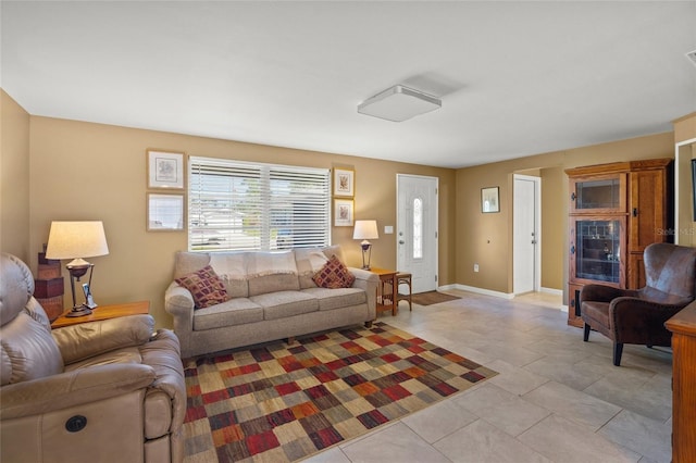 living room with light tile patterned flooring