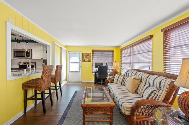 584 Beverly Rd, Venice, FL 34293 - living area with dark wood finished floors and ornamental molding