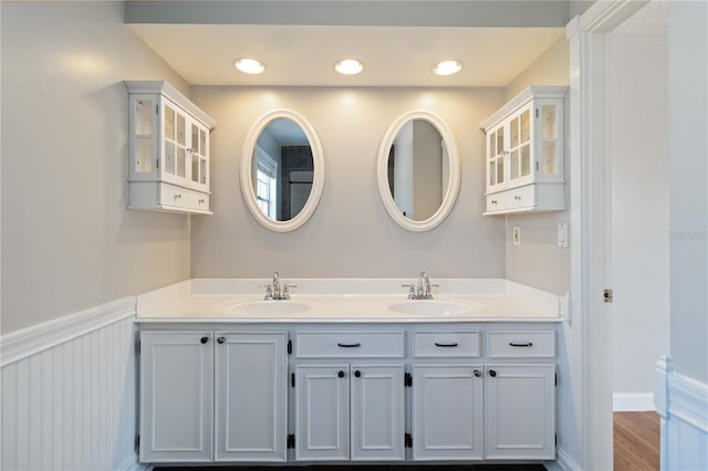 bathroom featuring vanity and hardwood / wood-style flooring