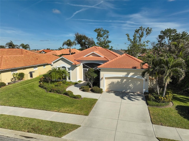 mediterranean / spanish-style home with a garage and a front lawn