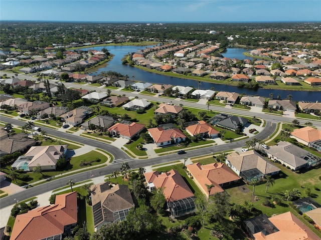 drone / aerial view with a water view