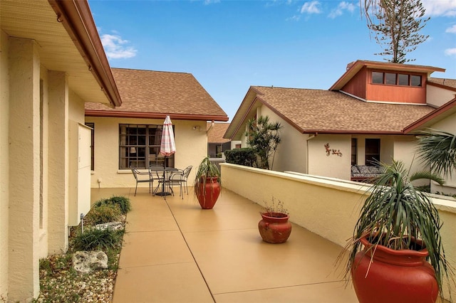 view of patio / terrace with a balcony