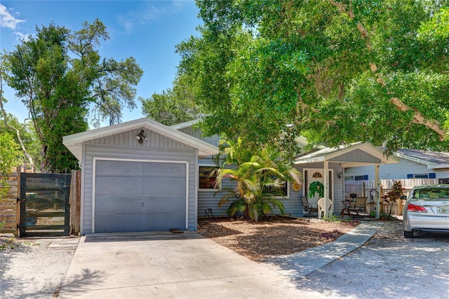 ranch-style house featuring a garage