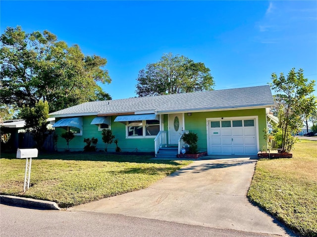 ranch-style house with a garage and a front yard