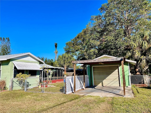 view of yard with a garage and an outdoor structure