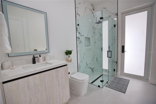 bathroom featuring tile patterned floors, walk in shower, vanity, and toilet