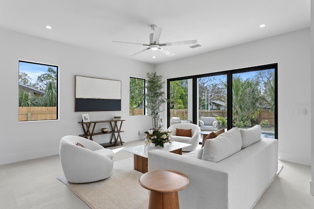 living room with ceiling fan