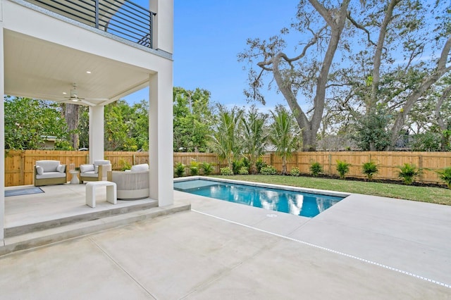 view of pool featuring ceiling fan, outdoor lounge area, and a patio area