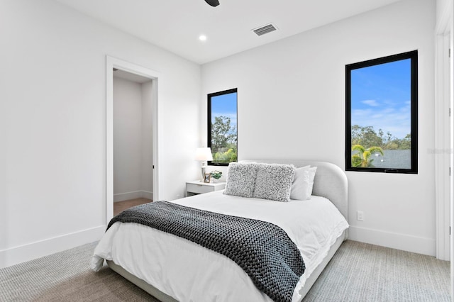 bedroom with carpet flooring and ceiling fan