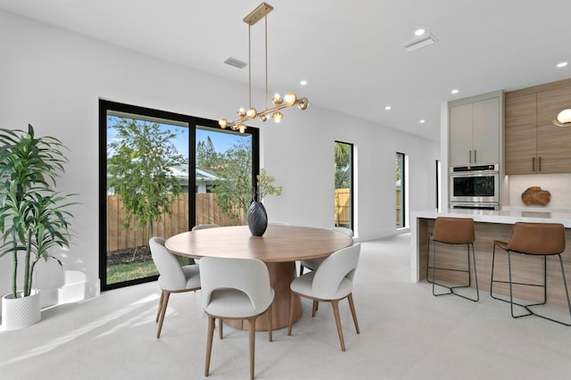 dining room with an inviting chandelier