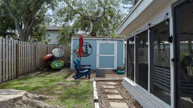 view of yard with a storage unit