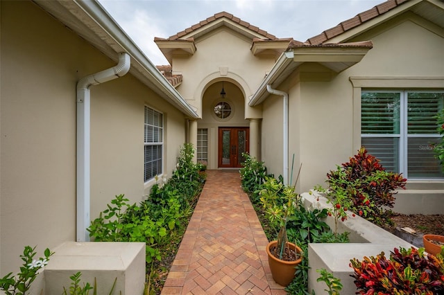 doorway to property featuring french doors