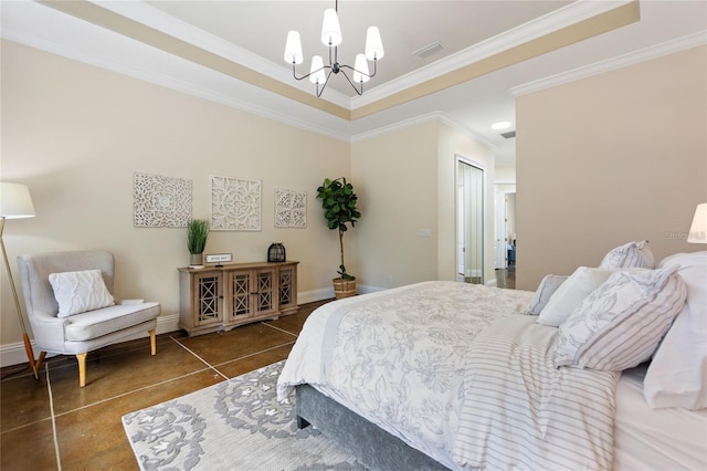 bedroom with crown molding, dark tile patterned flooring, a chandelier, and a tray ceiling