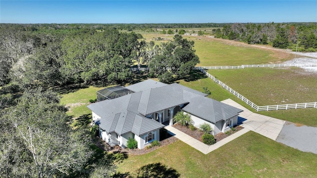 birds eye view of property featuring a rural view