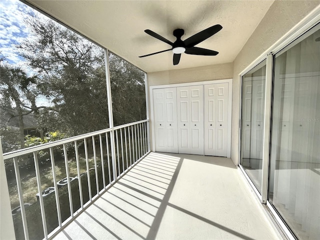 balcony featuring ceiling fan