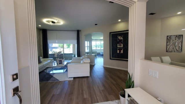 living room with dark hardwood / wood-style floors