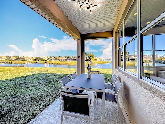 view of patio featuring a water view