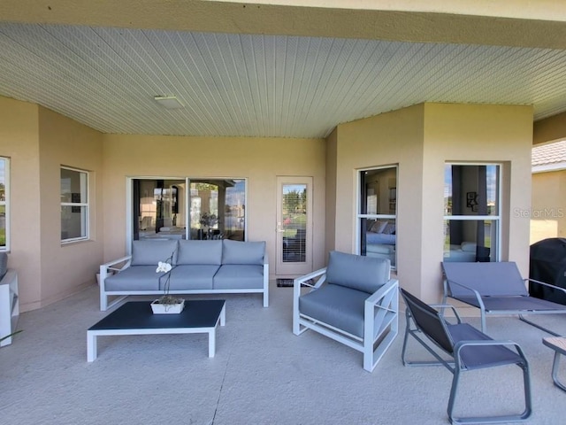 view of patio with an outdoor hangout area