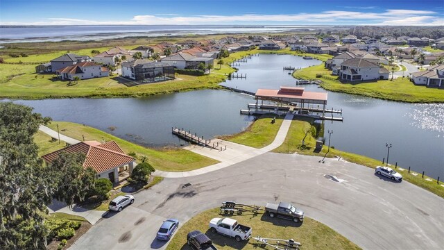 bird's eye view with a water view