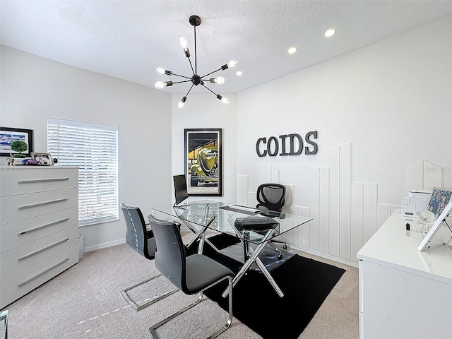 carpeted office space with a chandelier and a textured ceiling