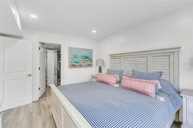 bedroom with light wood-type flooring