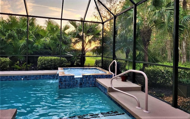 pool at dusk with pool water feature