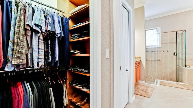 spacious closet with light tile patterned floors