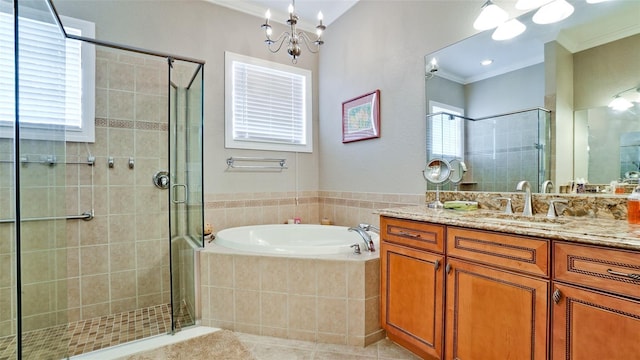 bathroom featuring tile patterned floors, vanity, plus walk in shower, and ornamental molding