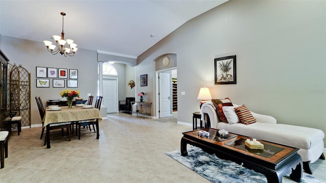 tiled living room featuring high vaulted ceiling and a chandelier