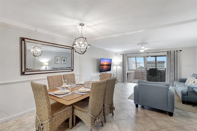 dining room featuring light tile patterned floors, ceiling fan with notable chandelier, and crown molding