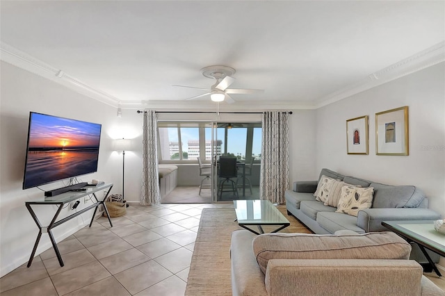 1200 E Peppertree Ln Unit 607, Sarasota, FL 34242 - living room featuring crown molding, a ceiling fan, and light tile patterned flooring