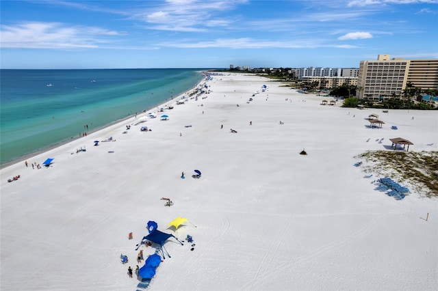 aerial view featuring a water view and a beach view