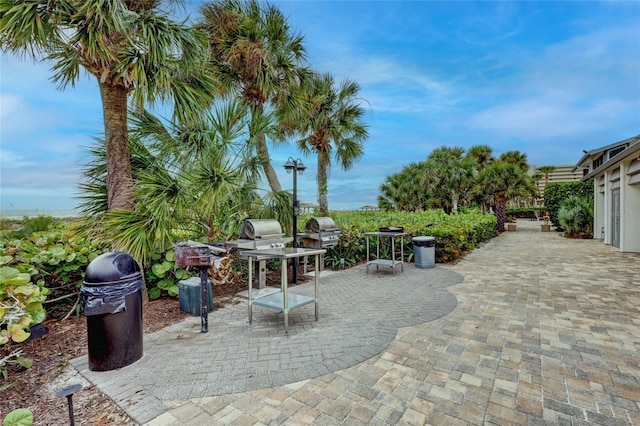 1200 E Peppertree Ln Unit 607, Sarasota, FL 34242 - view of patio featuring a grill
