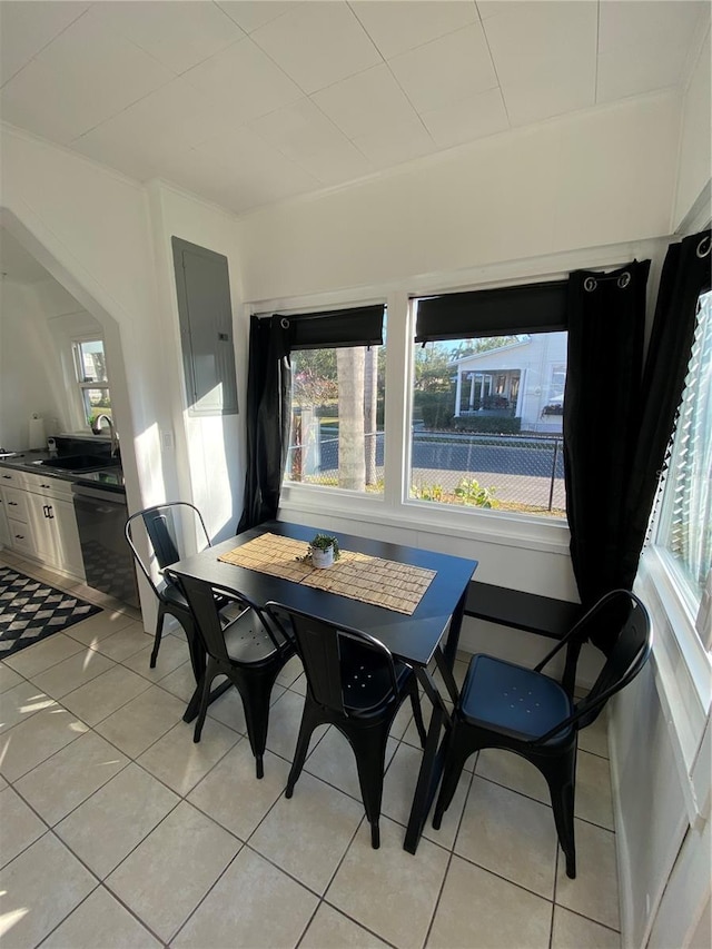 sunroom / solarium featuring sink and electric panel