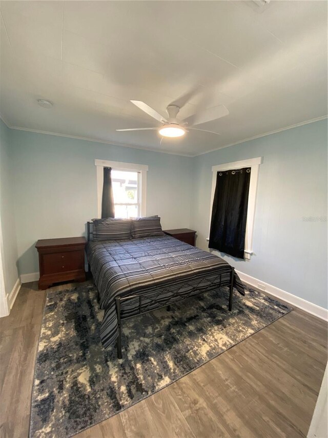 222 27th St W, Bradenton, FL 34205 - bedroom with wood finished floors, ornamental molding, and ceiling fan