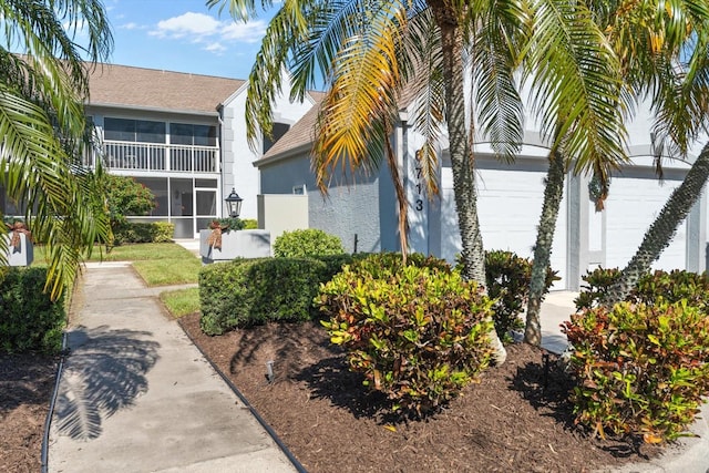 exterior space with a garage