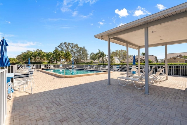 view of pool featuring a patio