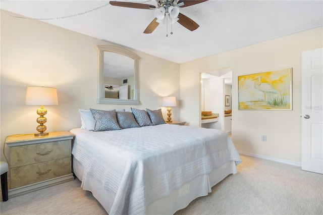 bedroom featuring ceiling fan and light colored carpet