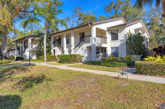 view of front of home with a front lawn