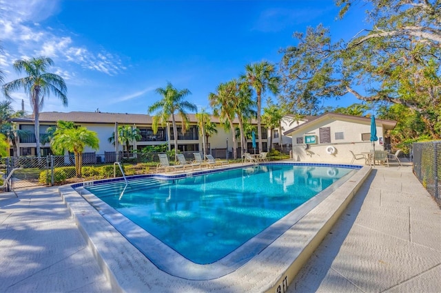 view of pool featuring a patio