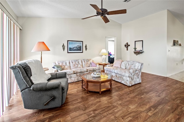 living room featuring hardwood / wood-style floors and vaulted ceiling