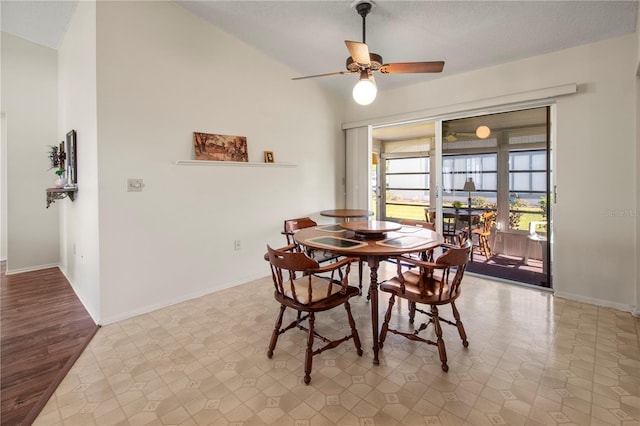 dining area featuring a textured ceiling, vaulted ceiling, light hardwood / wood-style flooring, and ceiling fan