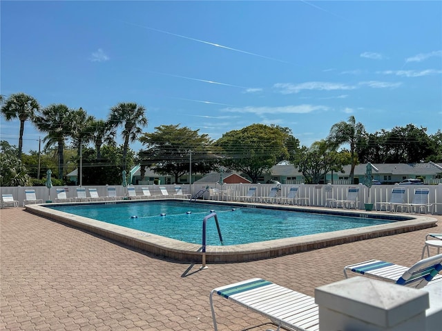 view of swimming pool with a patio area