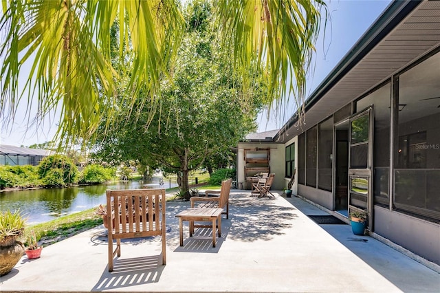 view of patio / terrace with a water view