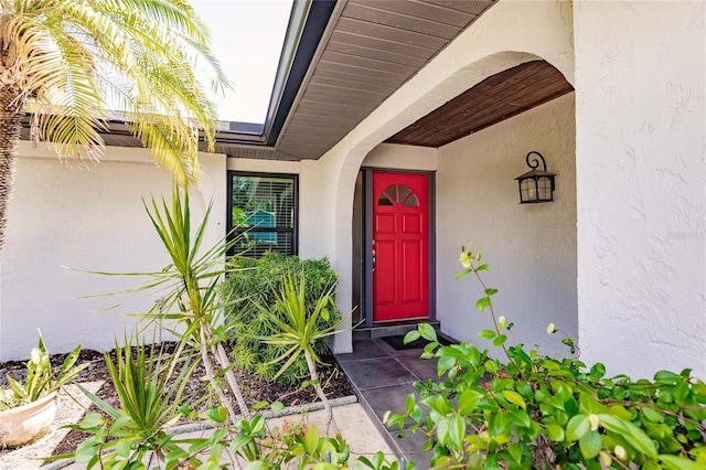 7707 10th Ave NW, Bradenton, FL 34209 - property entrance featuring stucco siding