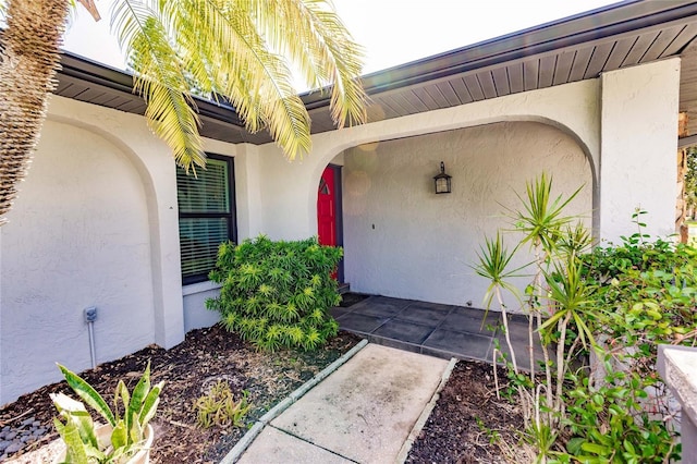 7707 10th Ave NW, Bradenton, FL 34209 - doorway to property with stucco siding