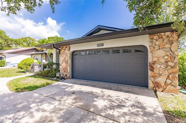 single story home featuring a garage