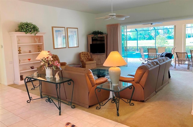 living room with light colored carpet and ceiling fan