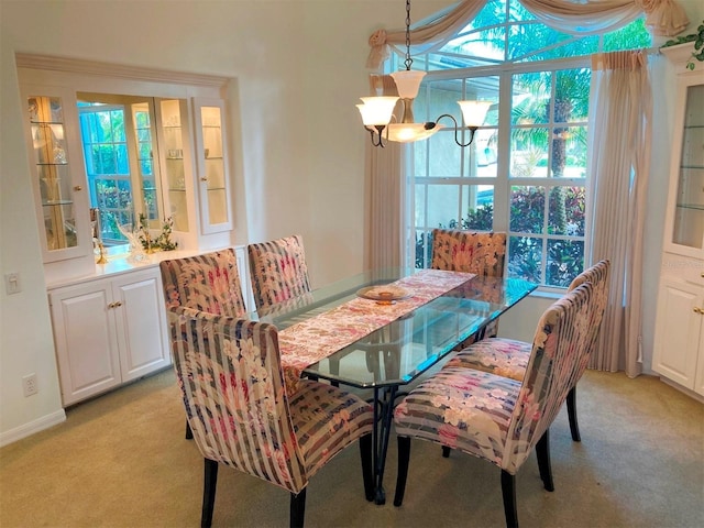 view of carpeted dining area