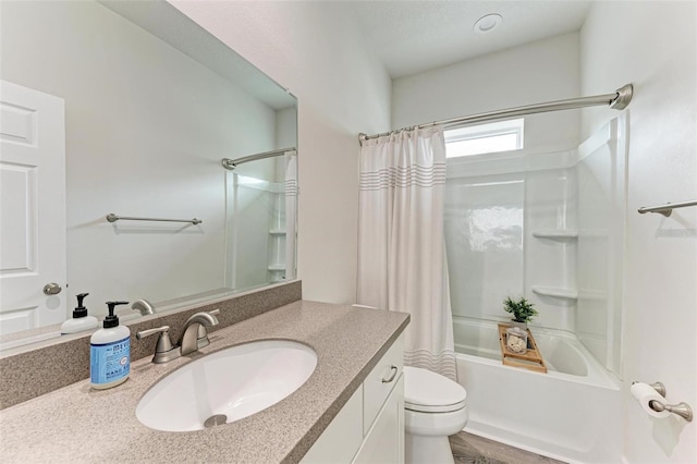 full bathroom with hardwood / wood-style flooring, vanity, toilet, and shower / tub combo